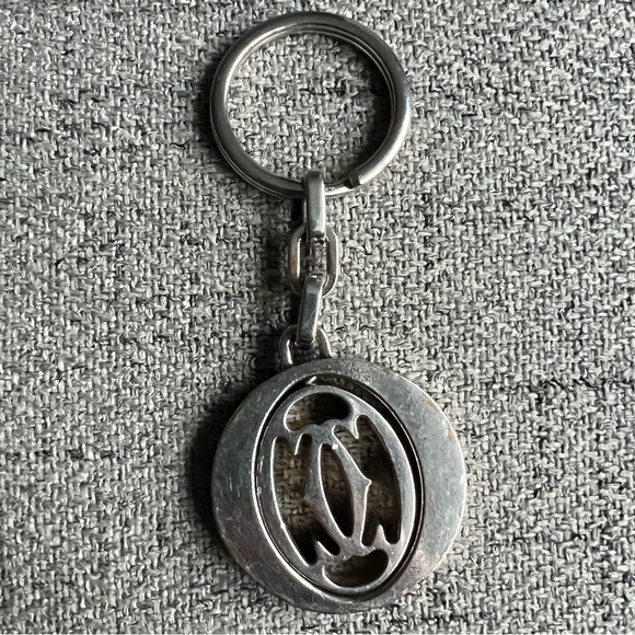 Cartier Accessories - Cartier stainless steel pivoting Double C key ring